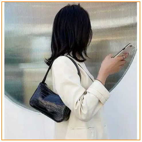 7. Vintage Croco Bag